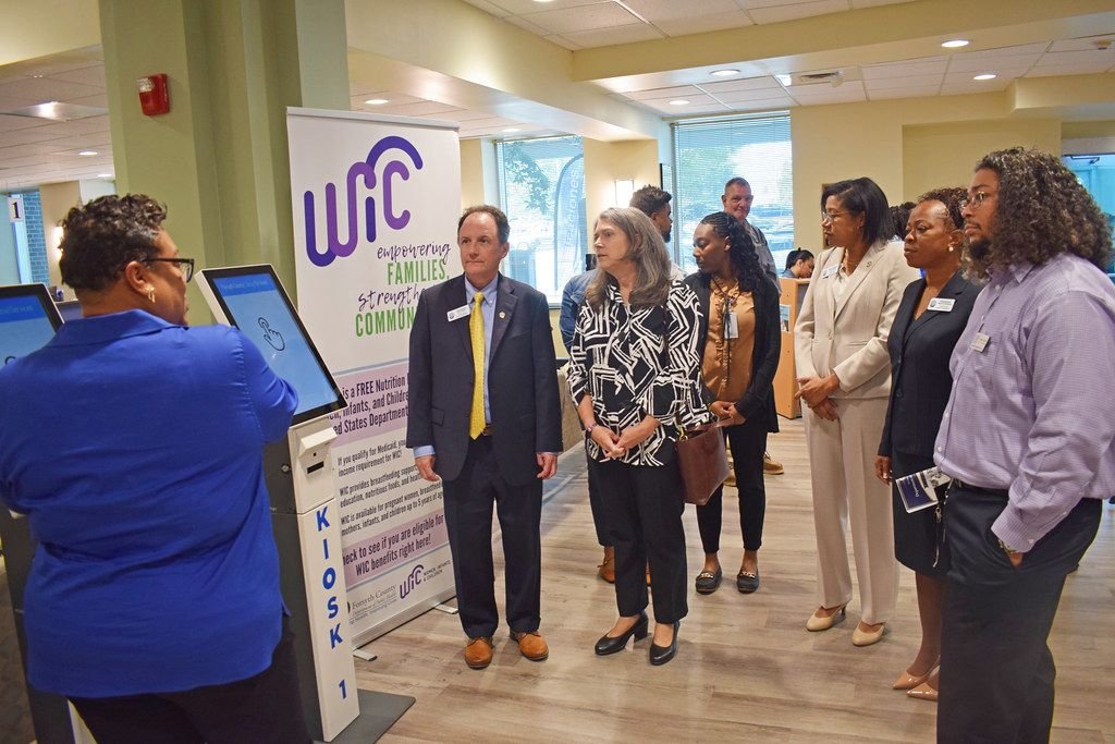 Chris Parker visiting a Department of Social Services lobby
